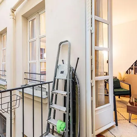 Chic Parisian Haven: Designer In The Heart Of